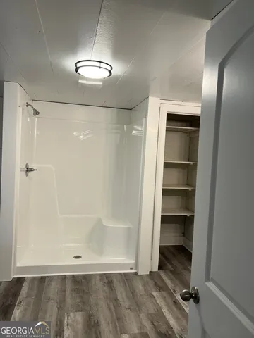 a view of a livingroom with a staircase