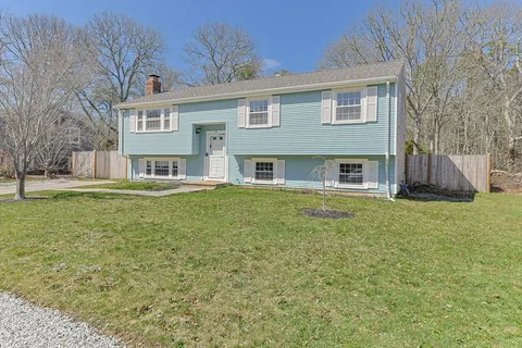 a front view of house with yard