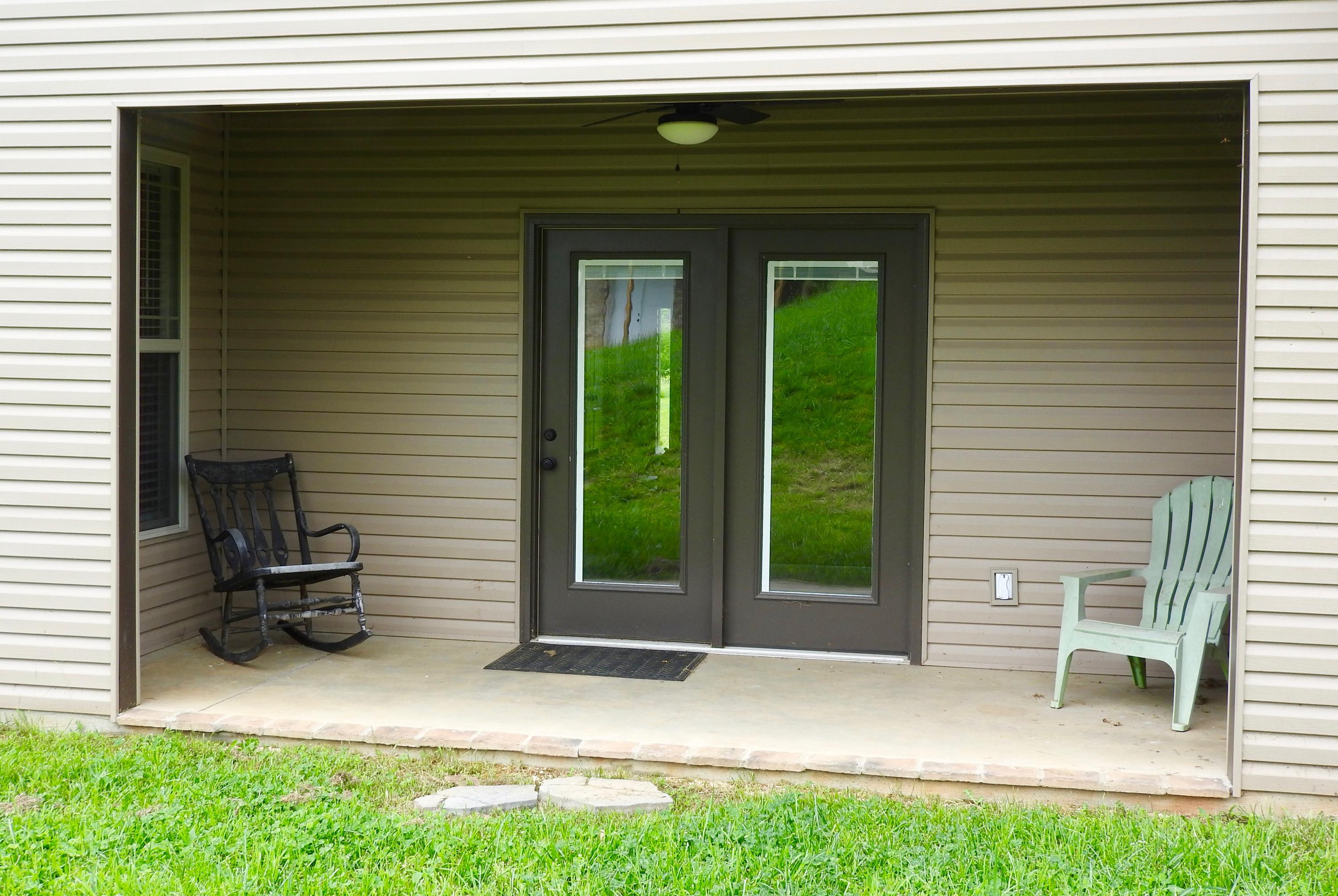 5904 Whisper Ridge Lane Corryton, TN 37721 - Photo 30 of 35 Covered Back Porch