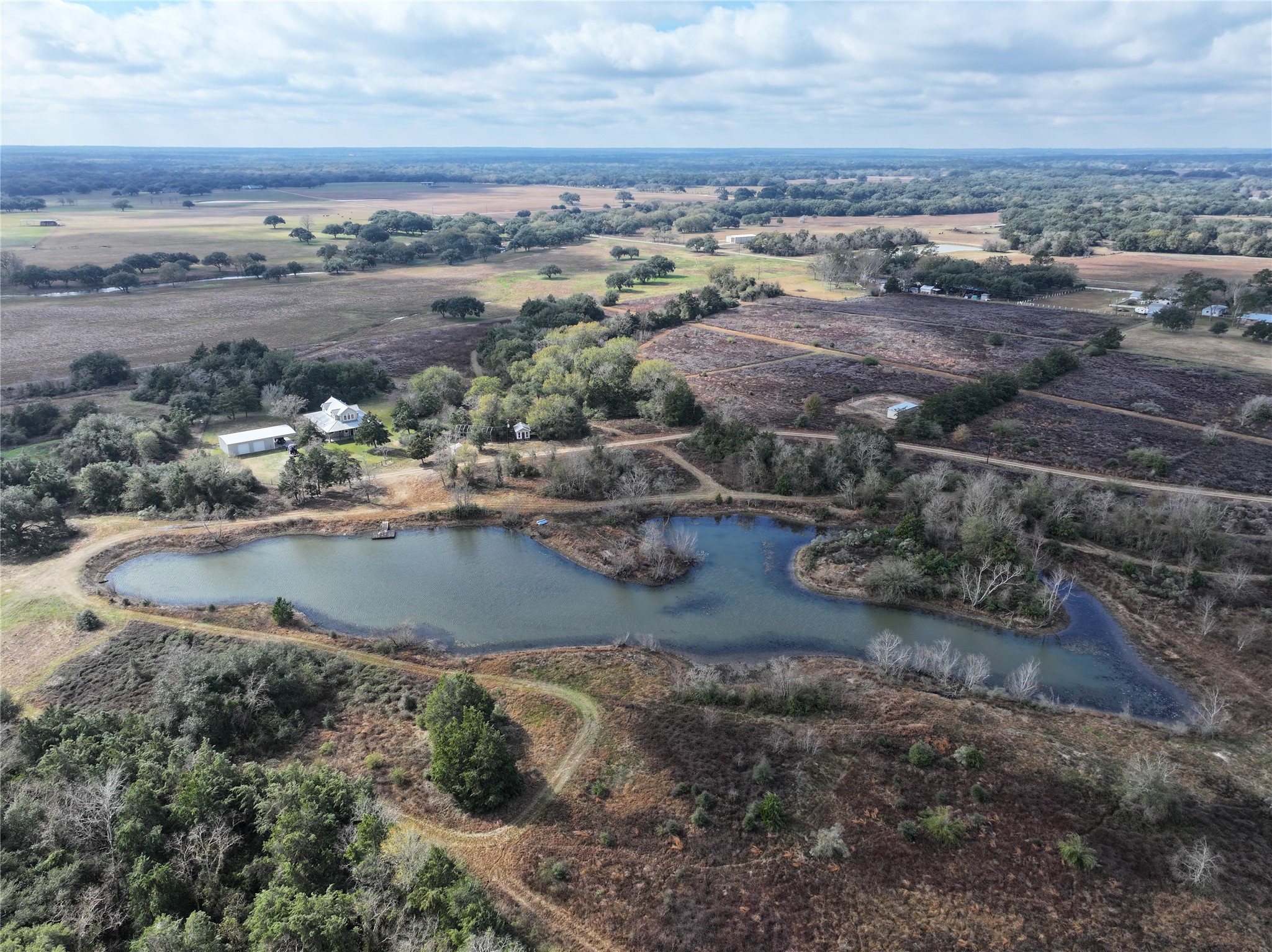 12218 Frantz Road Cat Spring, TX 78933 - Photo 24 of 25 an aerial view of residential houses with outdoor space