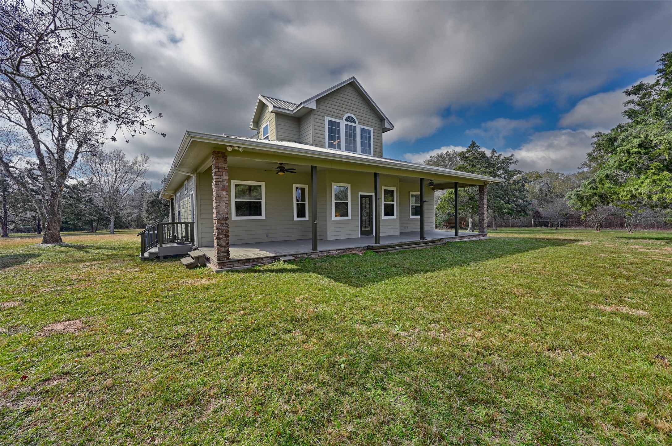 12218 Frantz Road Cat Spring, TX 78933 - Photo 3 of 25 front view of a house with a yard