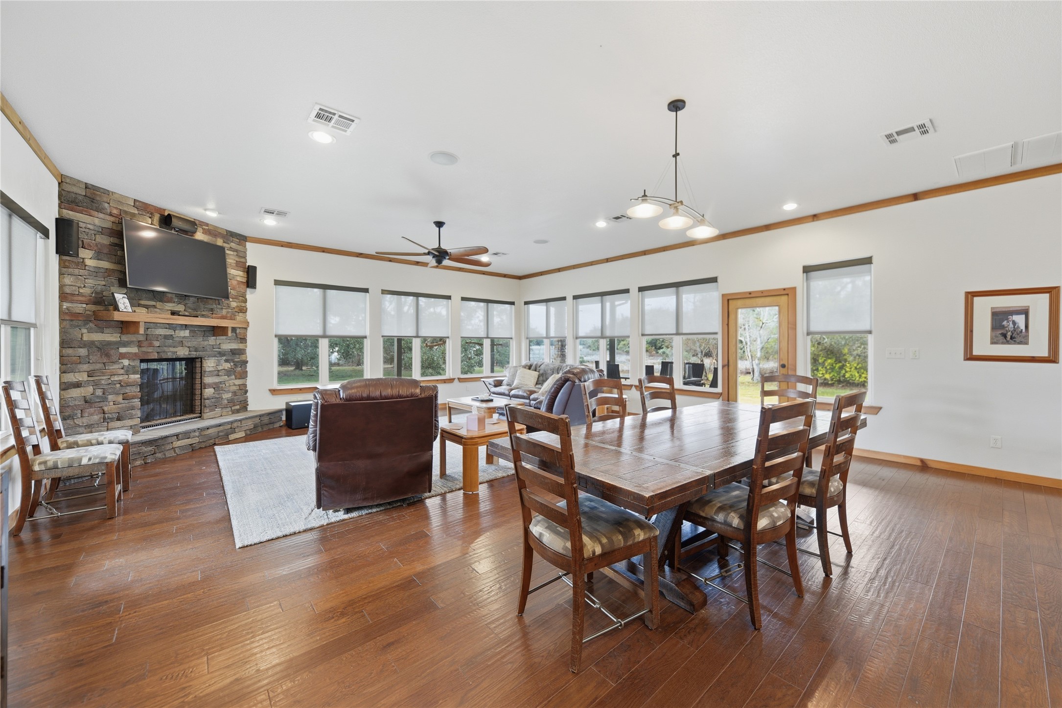 12218 Frantz Road Cat Spring, TX 78933 - Photo 6 of 25 a dining room with furniture window and wooden floor