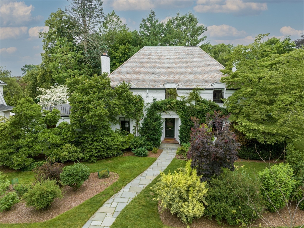 110 Pickwick Road Newton, MA 02465 - Photo 1 of 27 an aerial view of a house with yard and green space