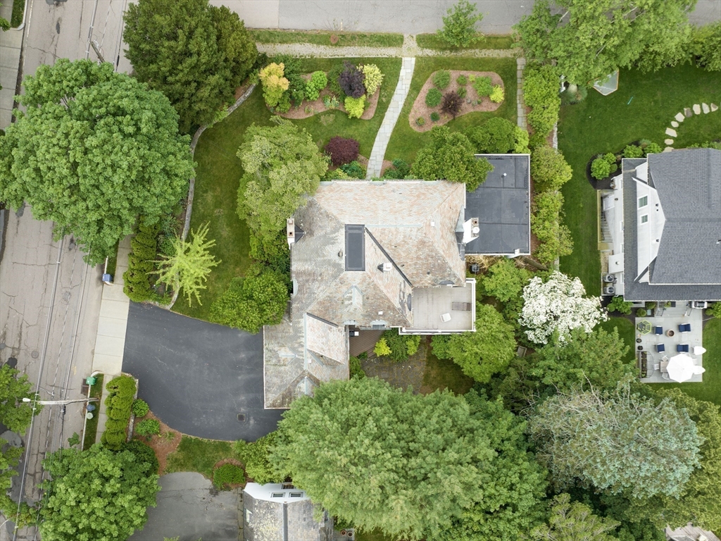 110 Pickwick Road Newton, MA 02465 - Photo 25 of 27 an aerial view of a house with a garden