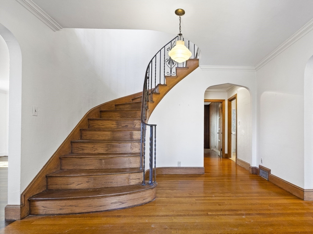 110 Pickwick Road Newton, MA 02465 - Photo 3 of 27 a view of entryway and hall with wooden floor