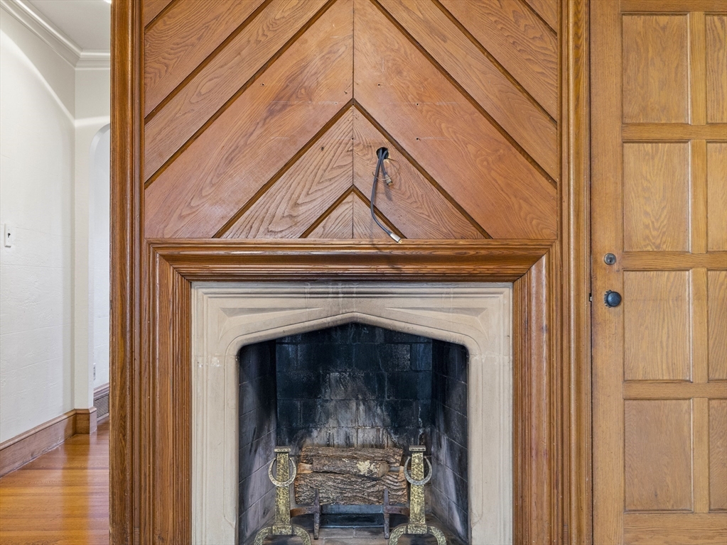 110 Pickwick Road Newton, MA 02465 - Photo 10 of 27 a view of a livingroom with furniture and a fireplace