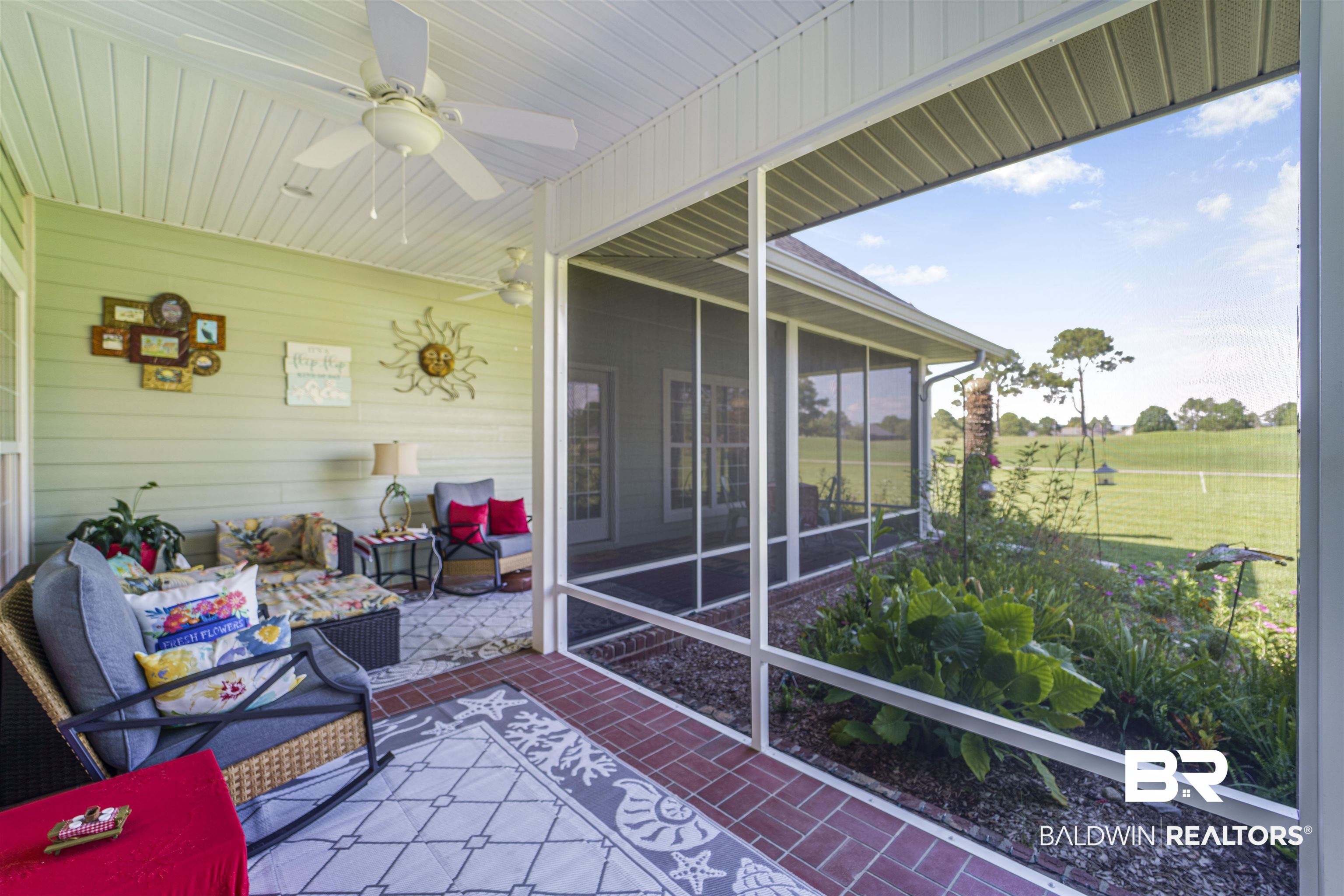 9505 Lakeview Drive Foley, AL 36535 - Photo 32 of 38 Sunroom with a ceiling fan