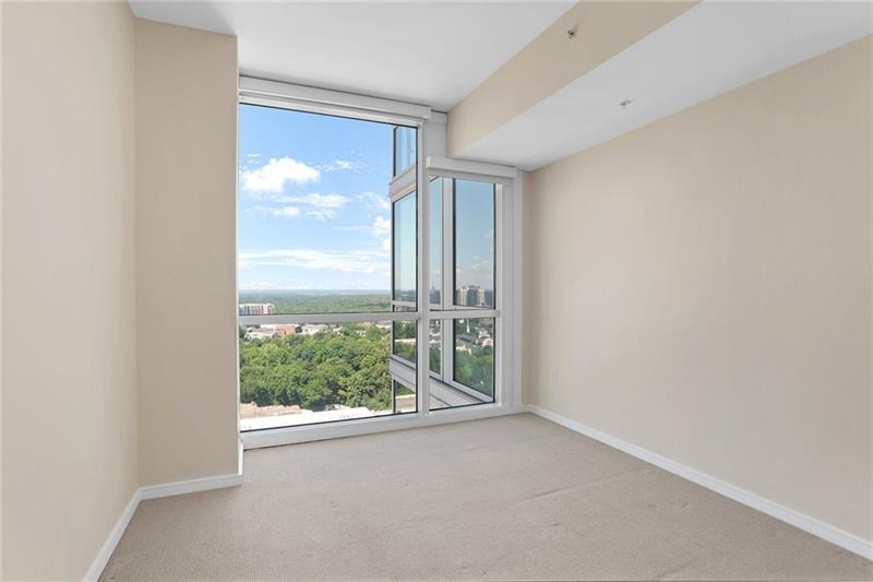 3325 Piedmont Road Northeast, Unit 2404 Atlanta, GA 30305 - Photo 17 of 36 a view of a room with a large window