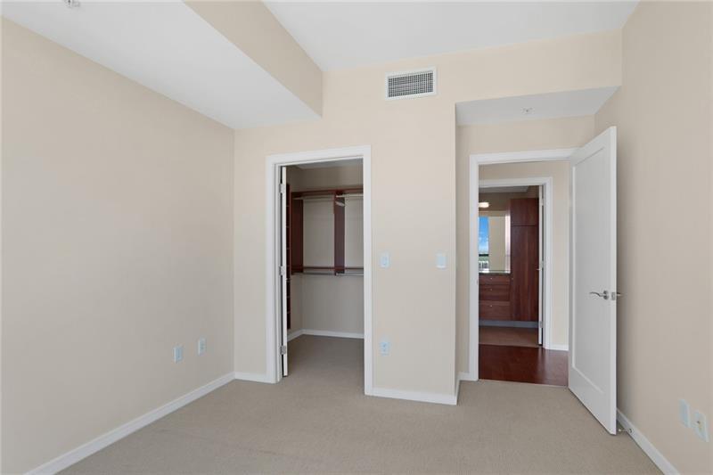 3325 Piedmont Road Northeast, Unit 2404 Atlanta, GA 30305 - Photo 18 of 36 wooden floor and closet in a room