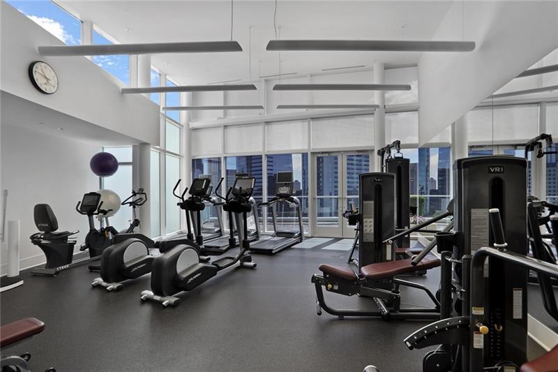 3325 Piedmont Road Northeast, Unit 2404 Atlanta, GA 30305 - Photo 30 of 36 a view of a room with gym equipment