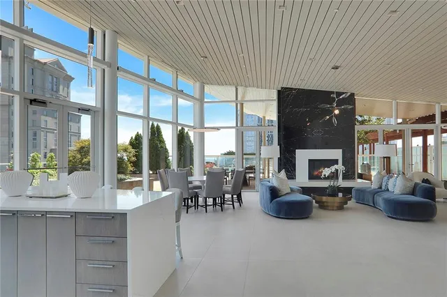 a view of living room with furniture and a chandelier