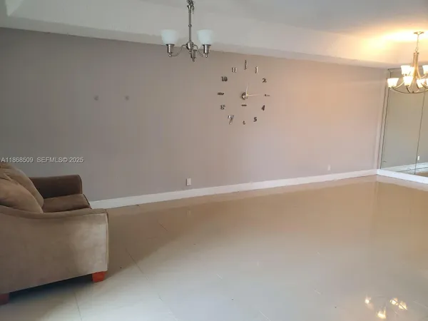 a bathroom with a shower sink and mirror