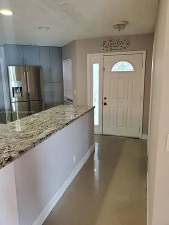 a view of a kitchen from a sink