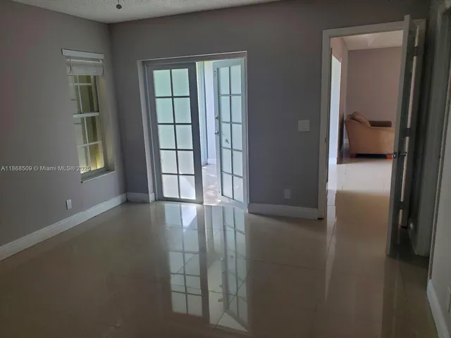 a view of livingroom with hardwood floor and window