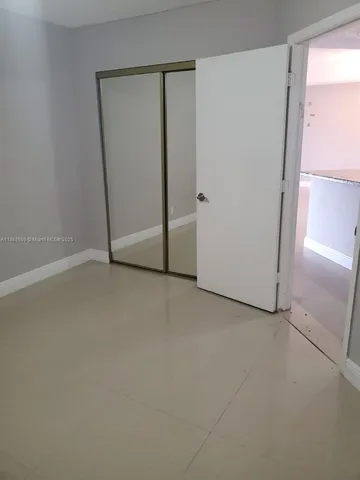 an empty room with a door
