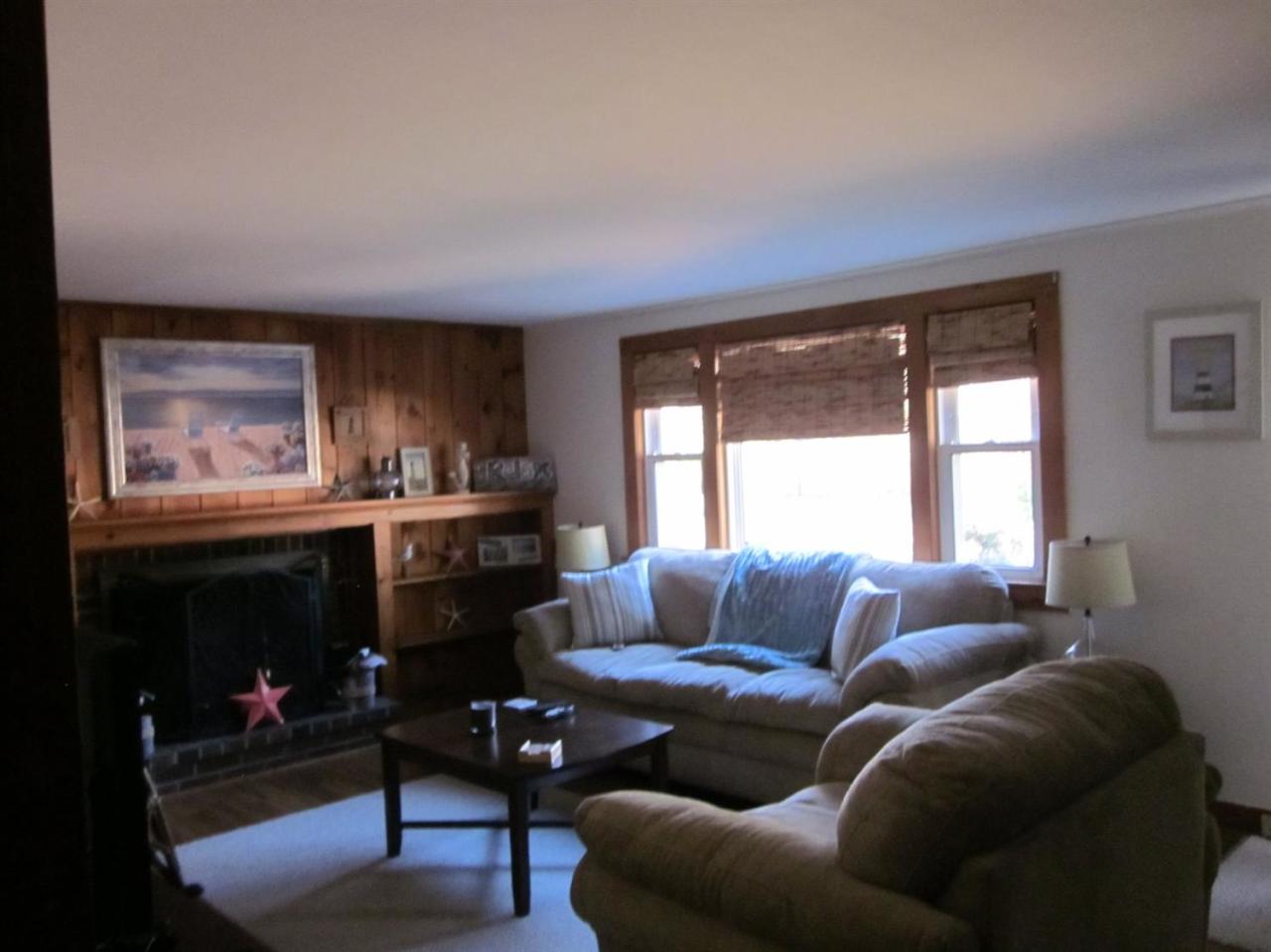 12 Captain Chase Road Dennis Port, MA 02639 - Photo 4 of 14 a living room with furniture and a large window