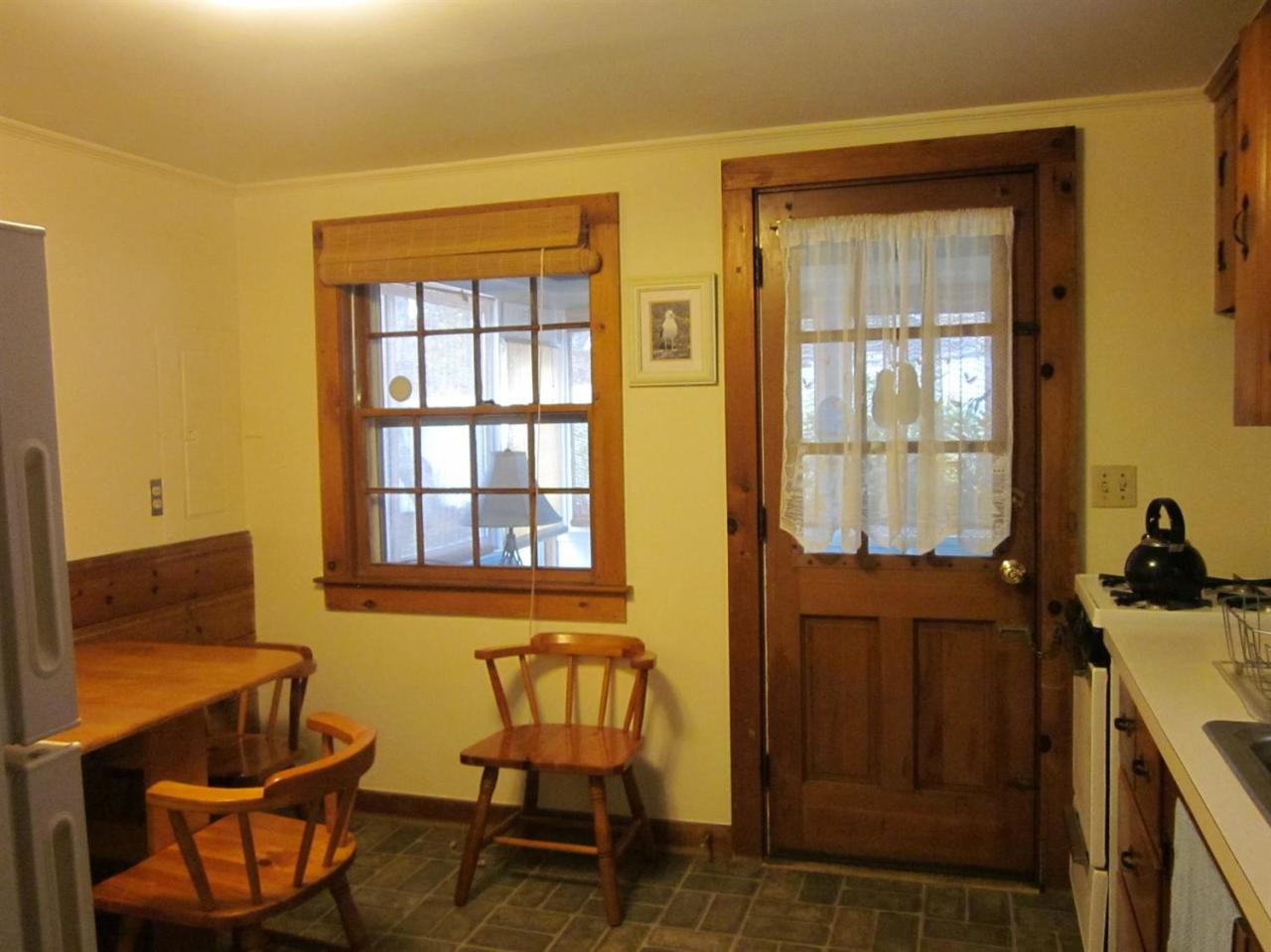12 Captain Chase Road Dennis Port, MA 02639 - Photo 6 of 14 a view of a livingroom with furniture and windows