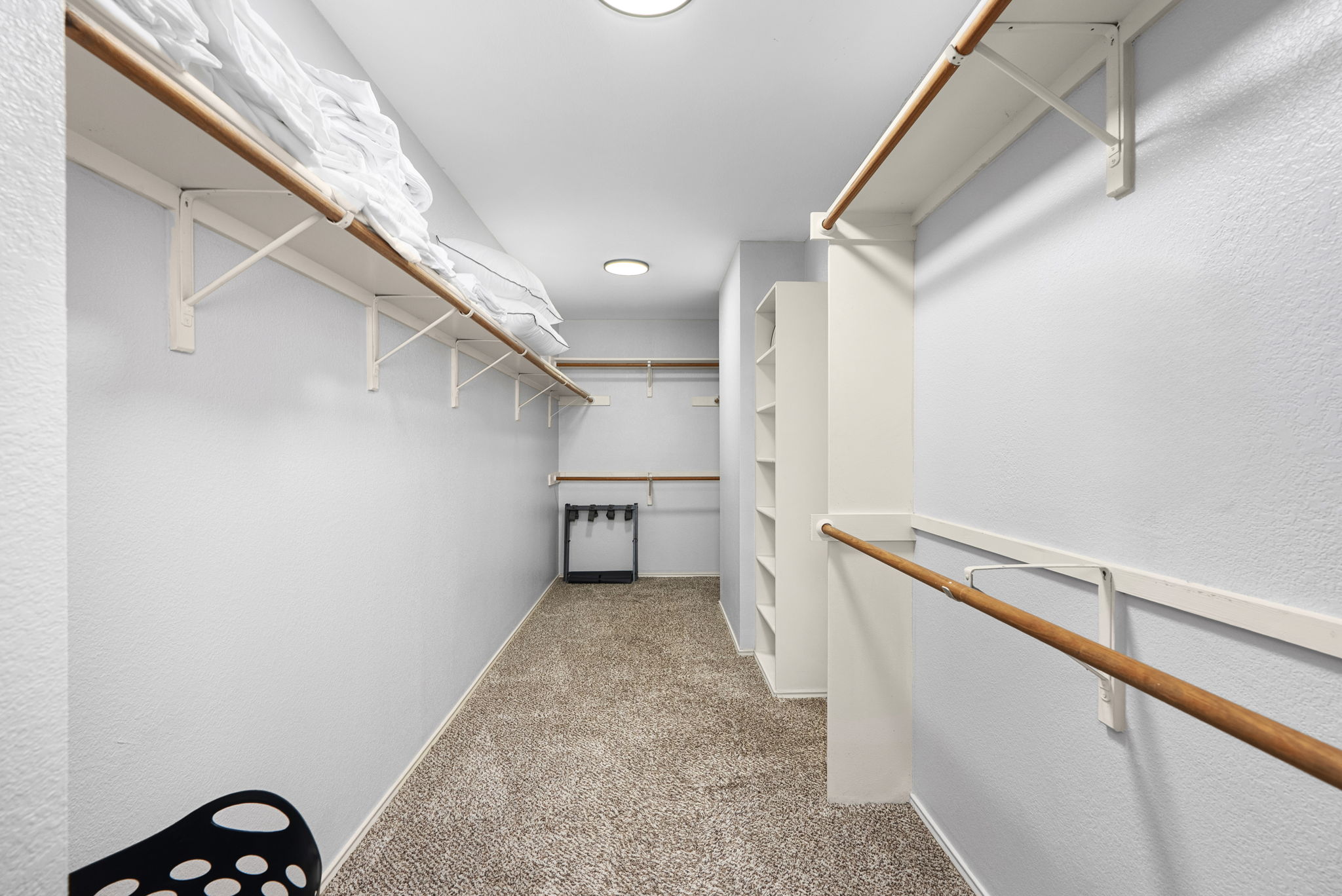 7906 Briarton Drive Austin, TX 78747 - Photo 23 of 38 a view of a hallway with a stairs