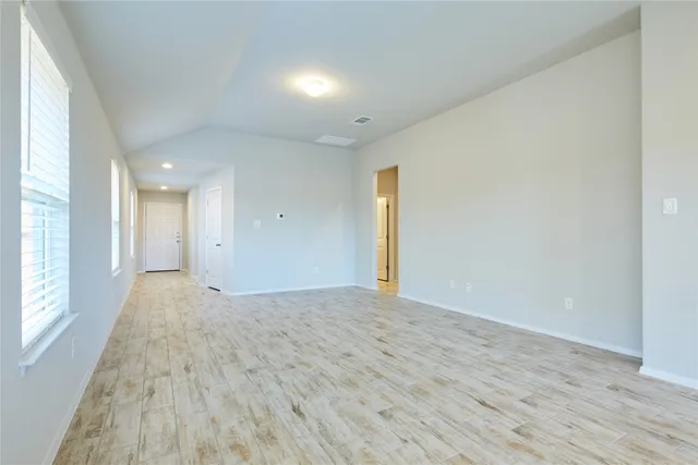 a view of an empty room and window