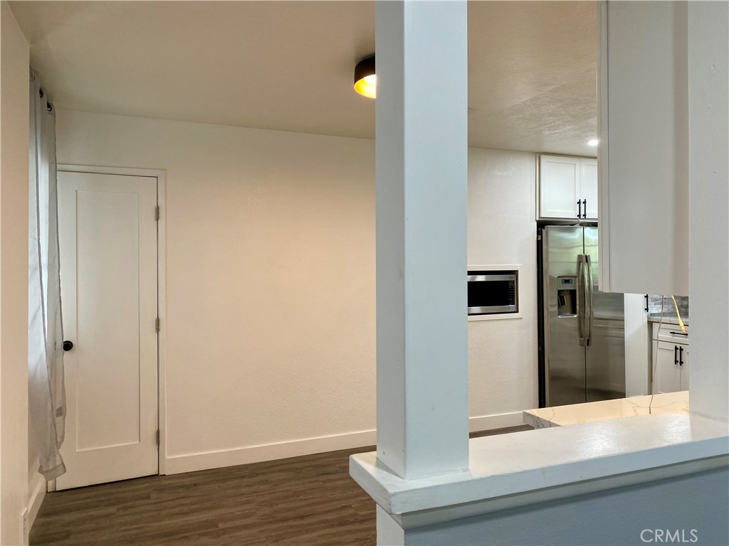 1144 Carson Street Costa Mesa, CA 92626 - Photo 23 of 50 kitchen with door to stairs