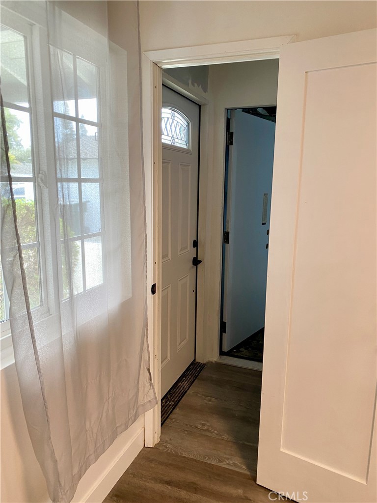1144 Carson Street Costa Mesa, CA 92626 - Photo 24 of 50 kitchen door leads to stairs, separate exterior entrance, and direct garage entrance