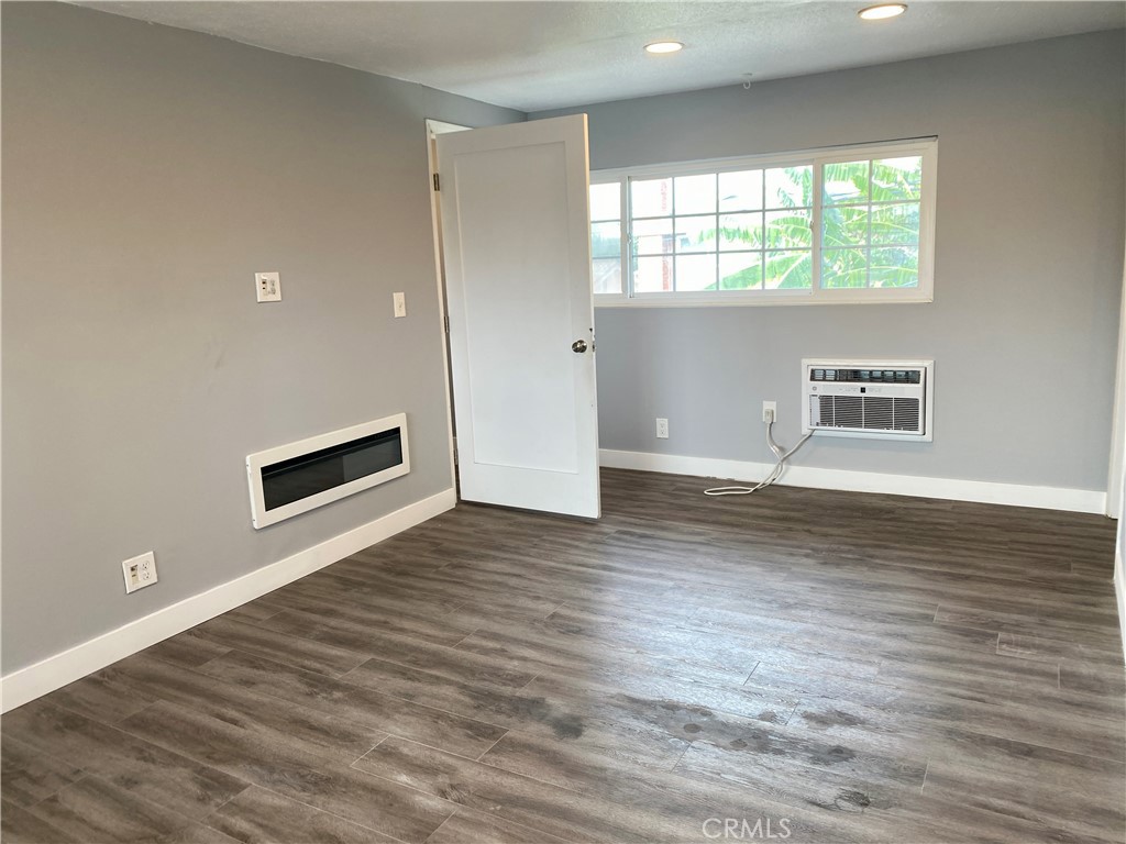 1144 Carson Street Costa Mesa, CA 92626 - Photo 29 of 50 electric fireplace and AC