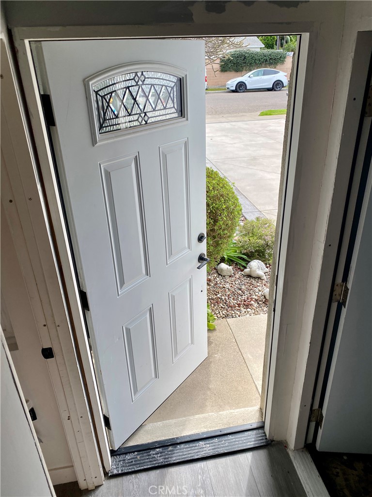 1144 Carson Street Costa Mesa, CA 92626 - Photo 38 of 50 Casita front door on front porch of house