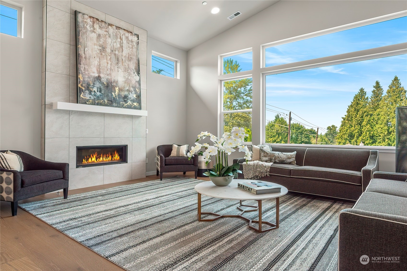 23617 23rd Avenue Southeast Bothell, WA 98021 - Photo 19 of 40 a living room with furniture and a fireplace