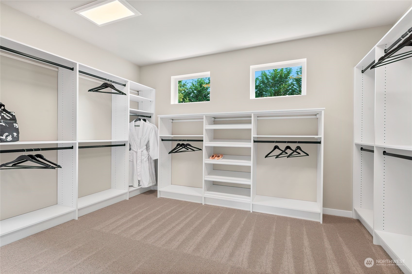 23617 23rd Avenue Southeast Bothell, WA 98021 - Photo 32 of 40 a view of walk in closet with empty racks