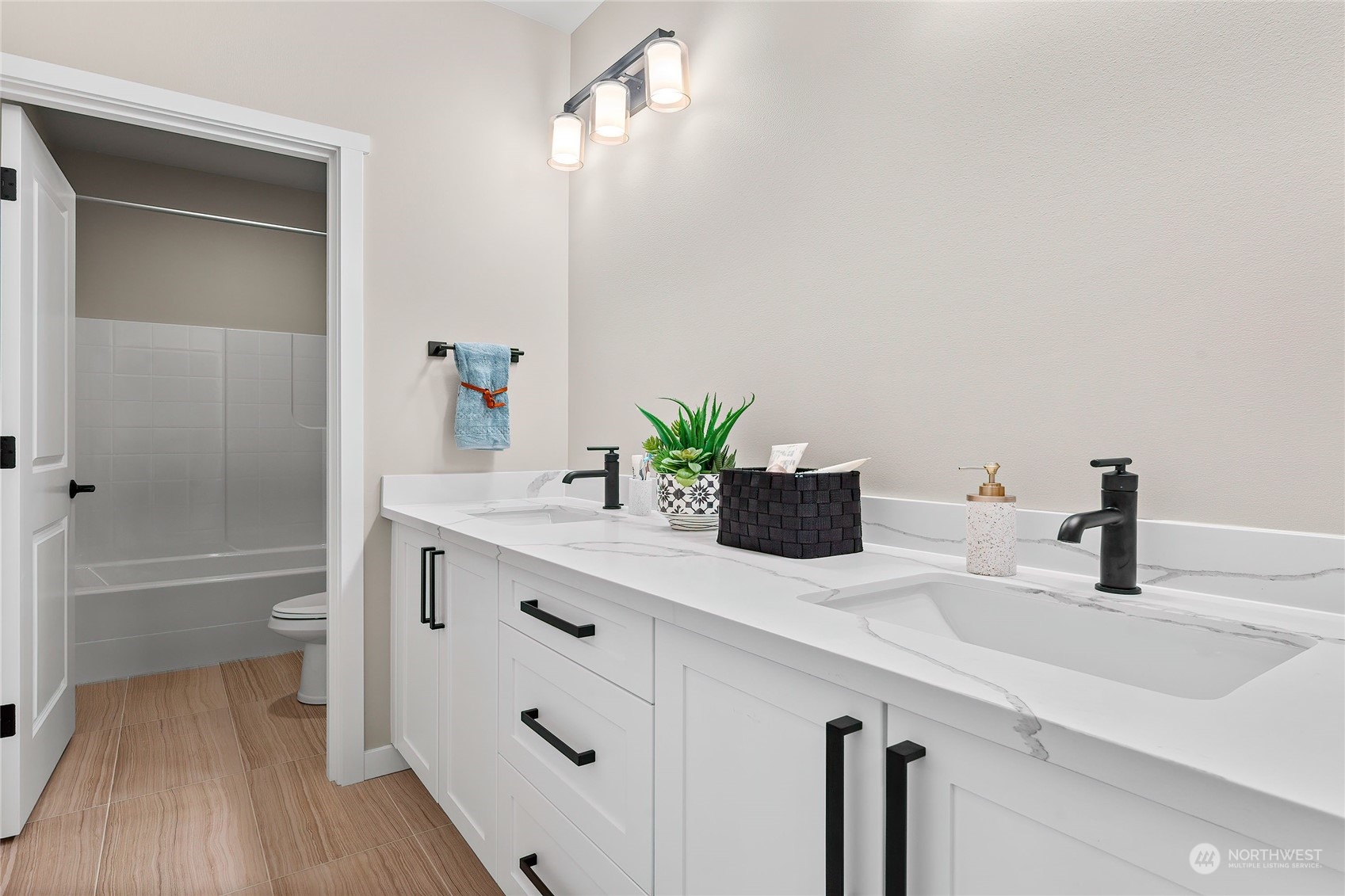 23617 23rd Avenue Southeast Bothell, WA 98021 - Photo 34 of 40 a bathroom with a sink and a mirror