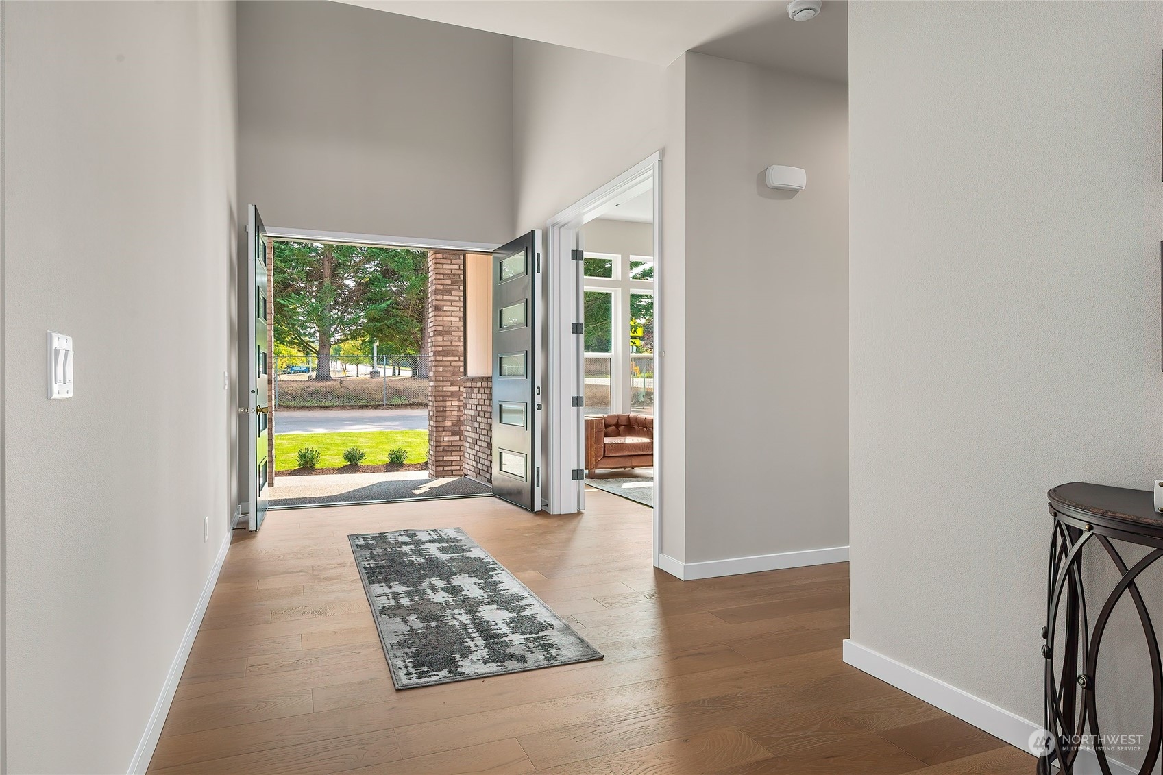 23617 23rd Avenue Southeast Bothell, WA 98021 - Photo 4 of 40 wooden floor in an empty room and a window
