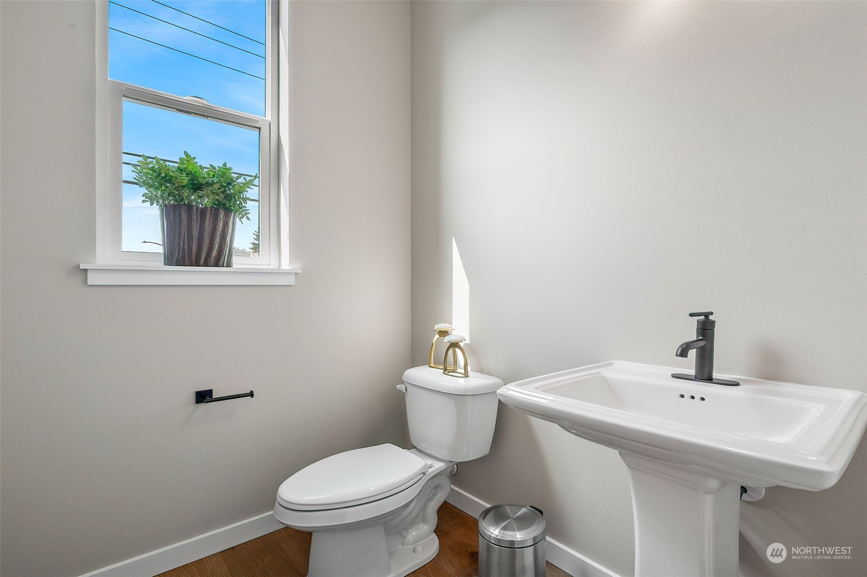 23617 23rd Avenue Southeast Bothell, WA 98021 - Photo 6 of 40 a bathroom with a sink a toilet and a mirror