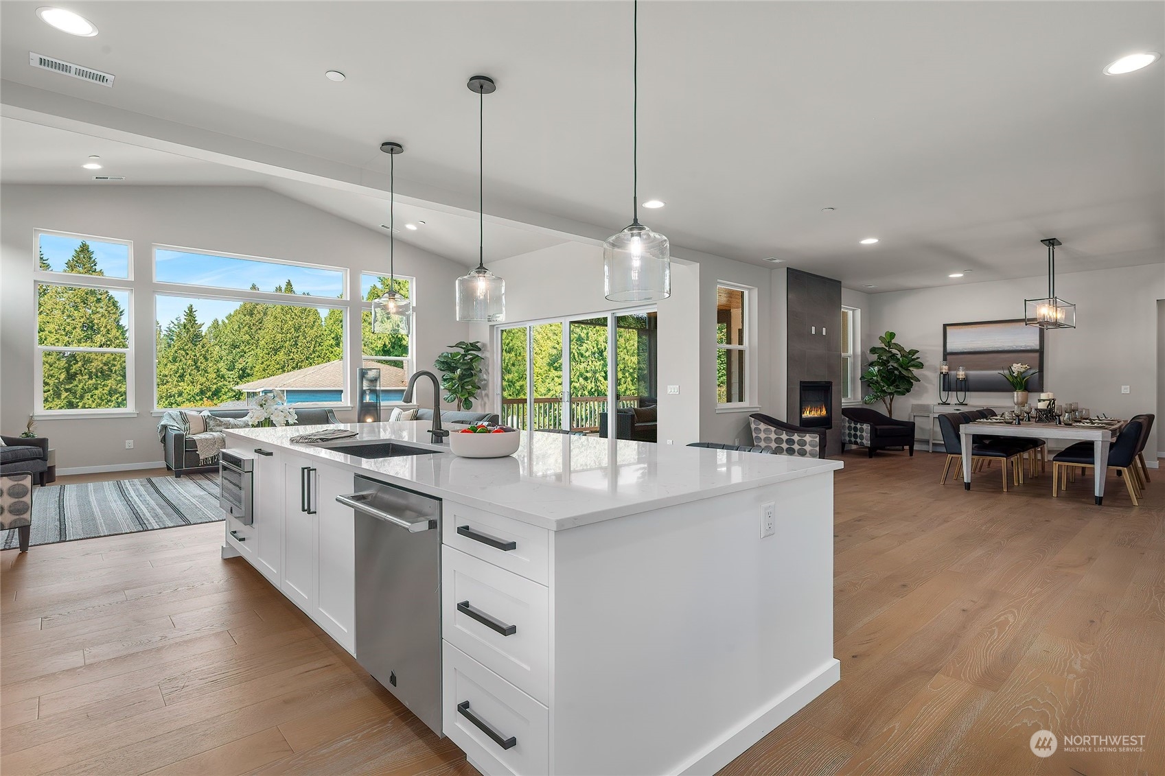 23617 23rd Avenue Southeast Bothell, WA 98021 - Photo 9 of 40 a large kitchen with kitchen island a large island in it