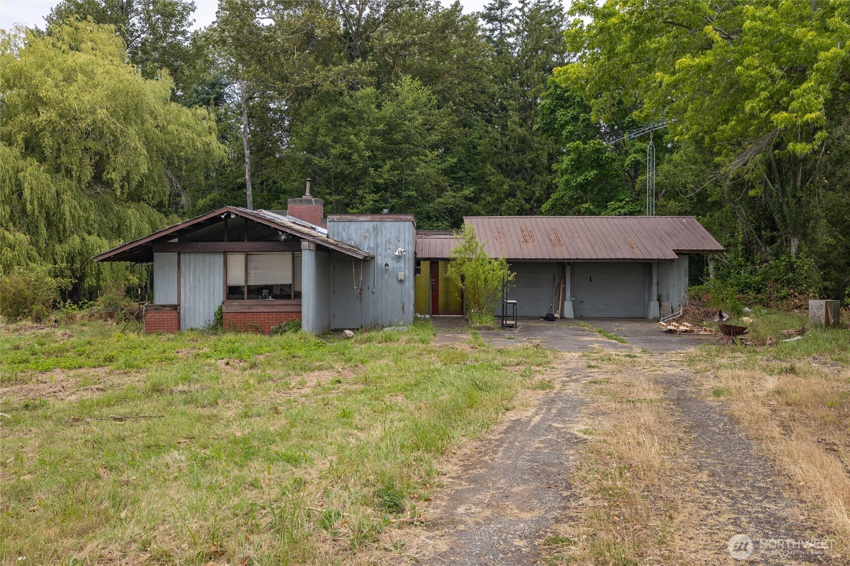 4256 Curtis Road Bellingham, WA 98226 - Photo 12 of 31 a view of a house with a yard and large tree