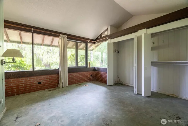 an empty room with windows