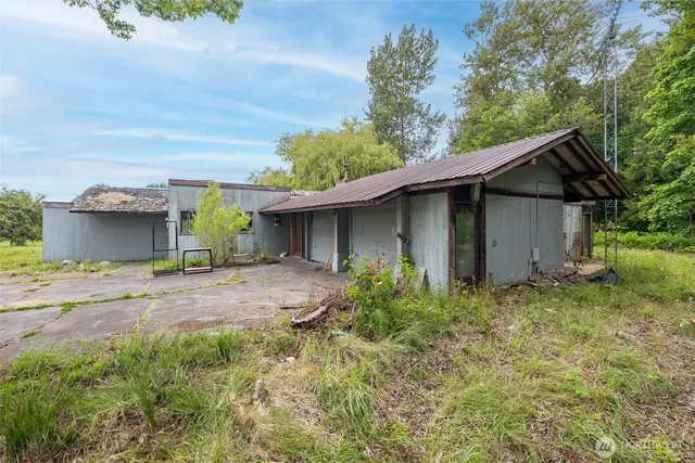 a house with trees in front of it