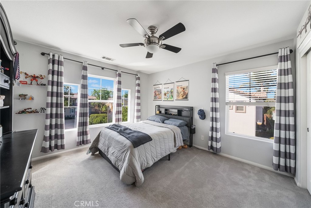 9 Flowerdale Ladera Ranch, CA 92694 - Photo 33 of 54 a bed room with a bed and a large window