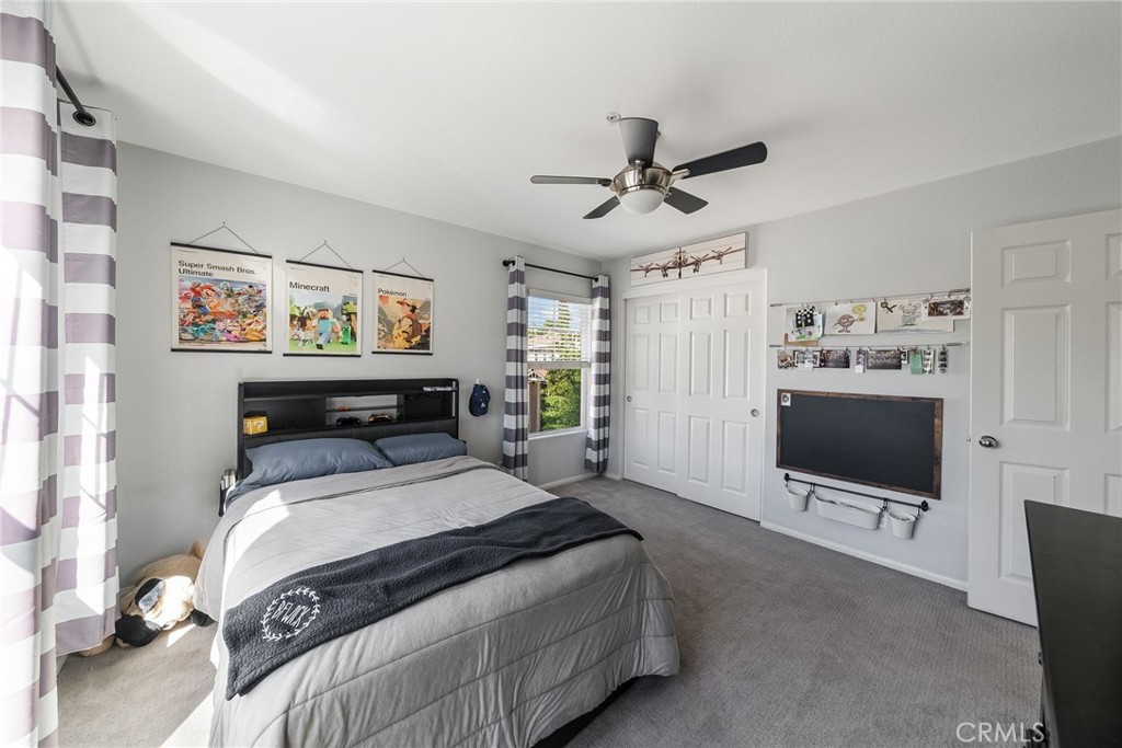 9 Flowerdale Ladera Ranch, CA 92694 - Photo 35 of 54 a bedroom with a bed and a flat screen tv