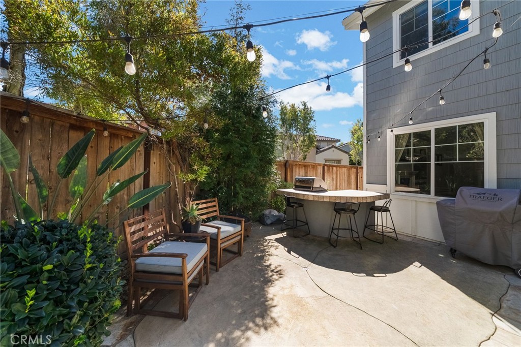 9 Flowerdale Ladera Ranch, CA 92694 - Photo 43 of 54 a backyard of a house with table and chairs