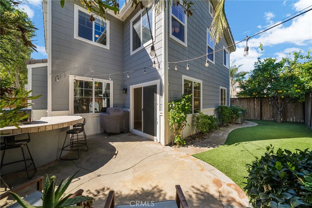 9 Flowerdale Ladera Ranch, CA 92694 - Photo 44 of 54 a view of a patio with couches table and chairs and potted plants