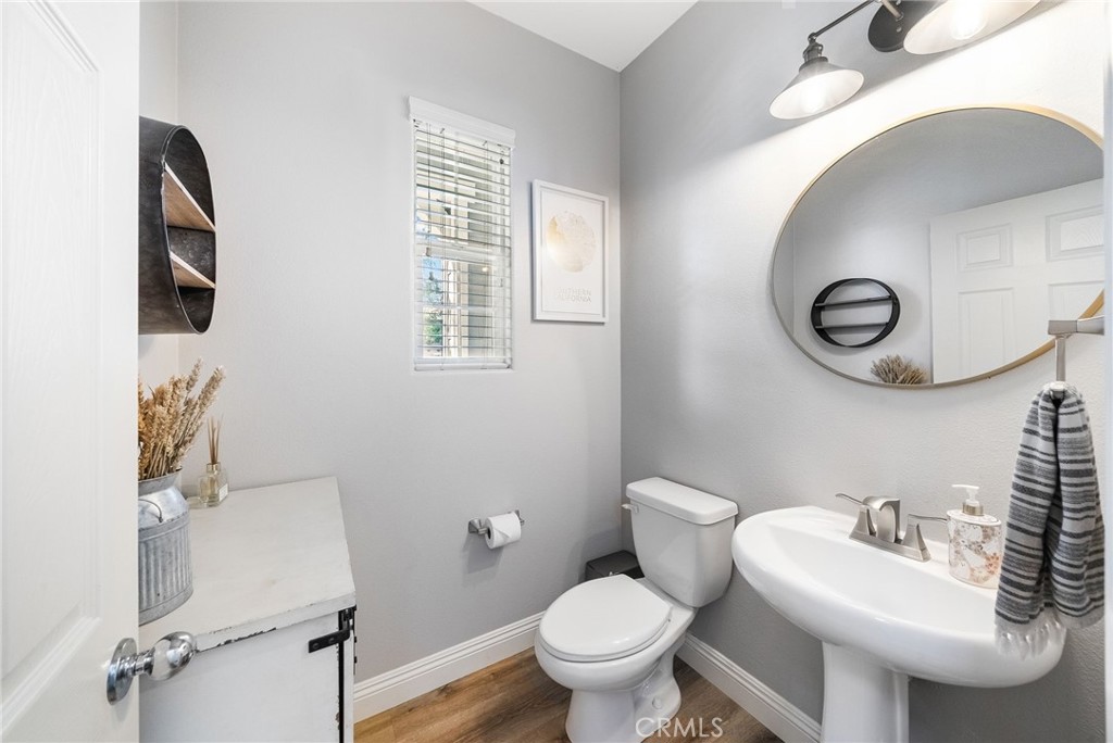 9 Flowerdale Ladera Ranch, CA 92694 - Photo 7 of 54 a bathroom with a sink mirror and toilet