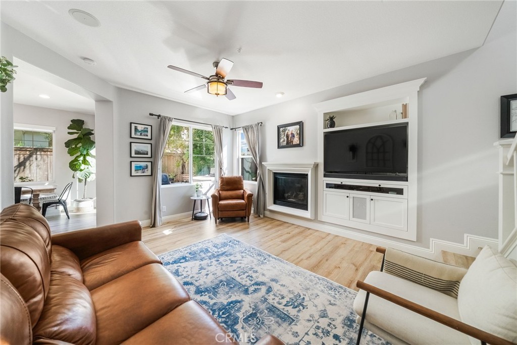 9 Flowerdale Ladera Ranch, CA 92694 - Photo 9 of 54 a living room with furniture and a flat screen tv
