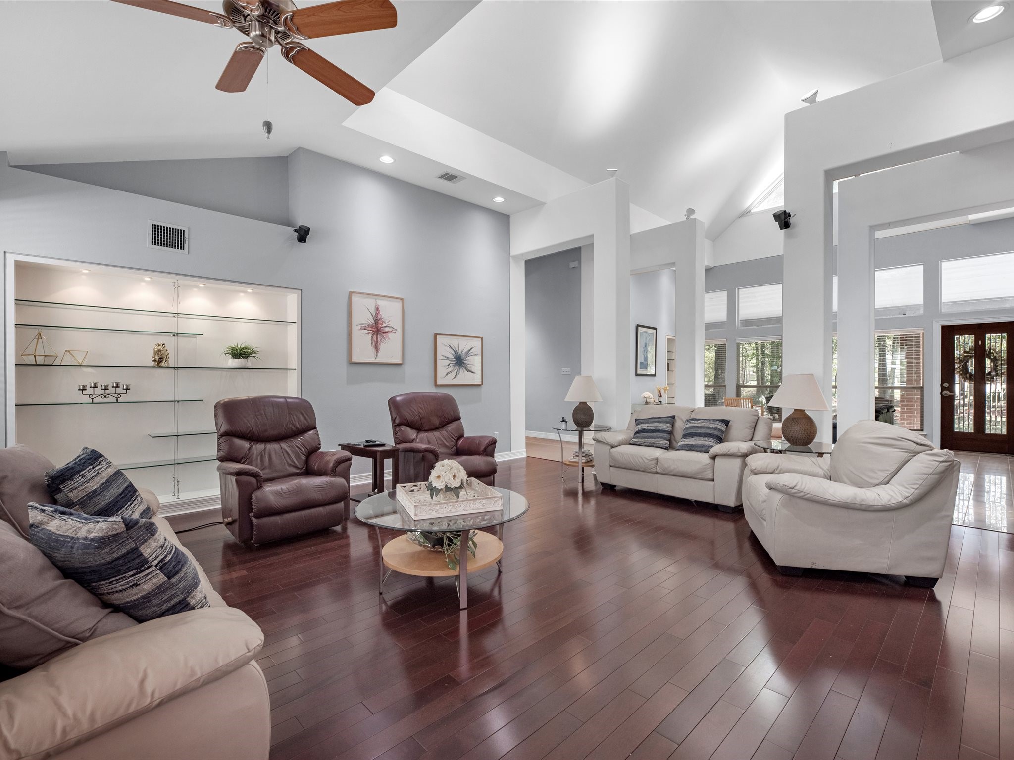 715 Commons Lakeview Drive Huffman, TX 77336 - Photo 13 of 50 a living room with furniture and wooden floor
