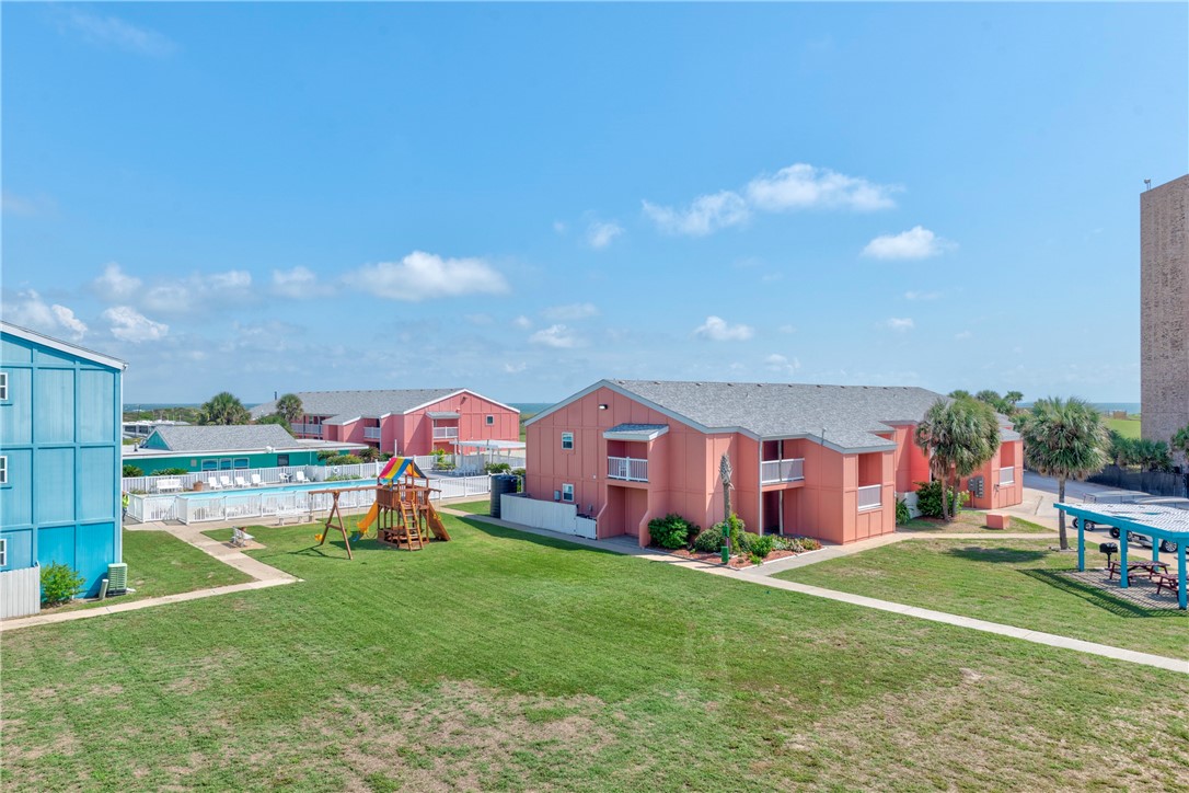 800 Beach Access Road Port Aransas, TX 78373 - Photo 10 of 13 a view of a big room with table and chairs