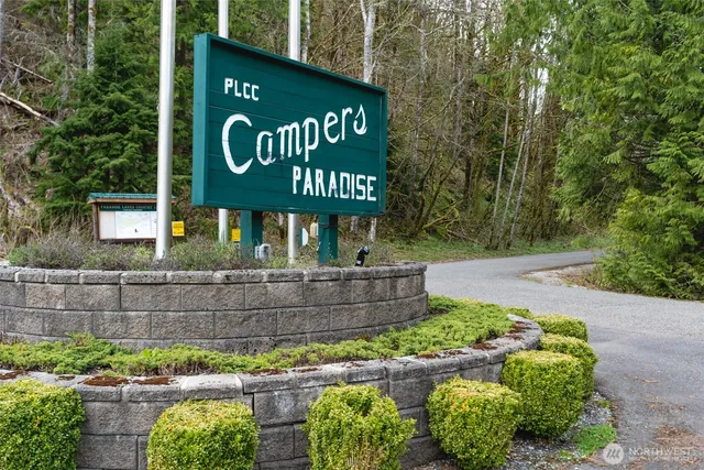 a view of outdoor space table and chairs under an umbrella