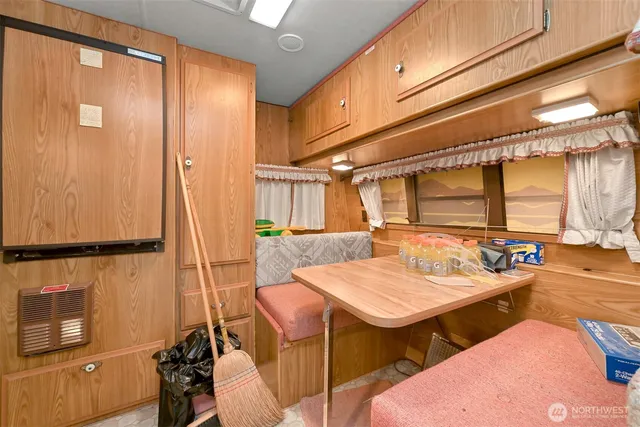 a view of a balcony and dining area