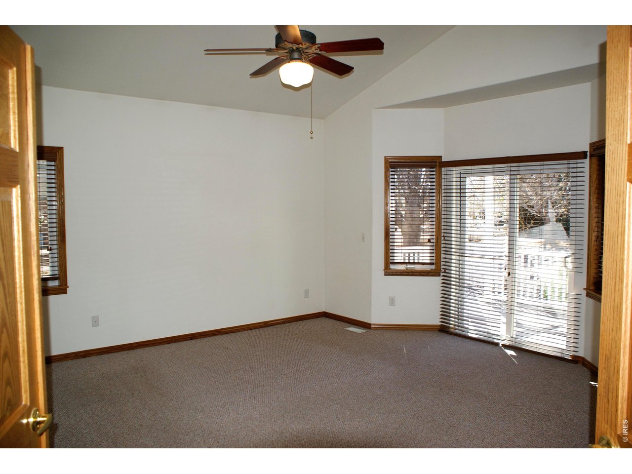 6576 Saddleback Avenue Firestone, CO 80504 - Photo 11 of 25 a view of an empty room with a window
