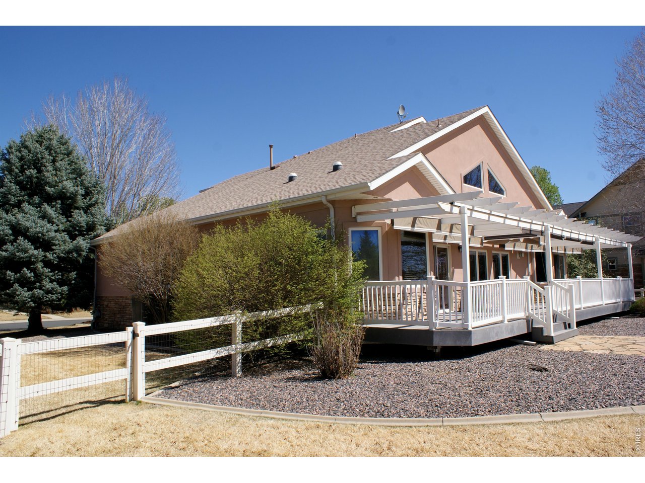 6576 Saddleback Avenue Firestone, CO 80504 - Photo 21 of 25 a front view of a house with a yard