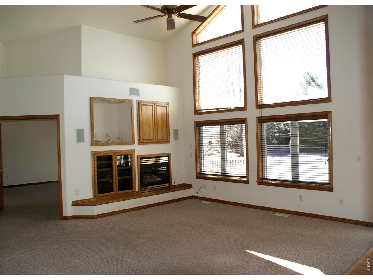 6576 Saddleback Avenue Firestone, CO 80504 - Photo 6 of 25 an empty room with windows