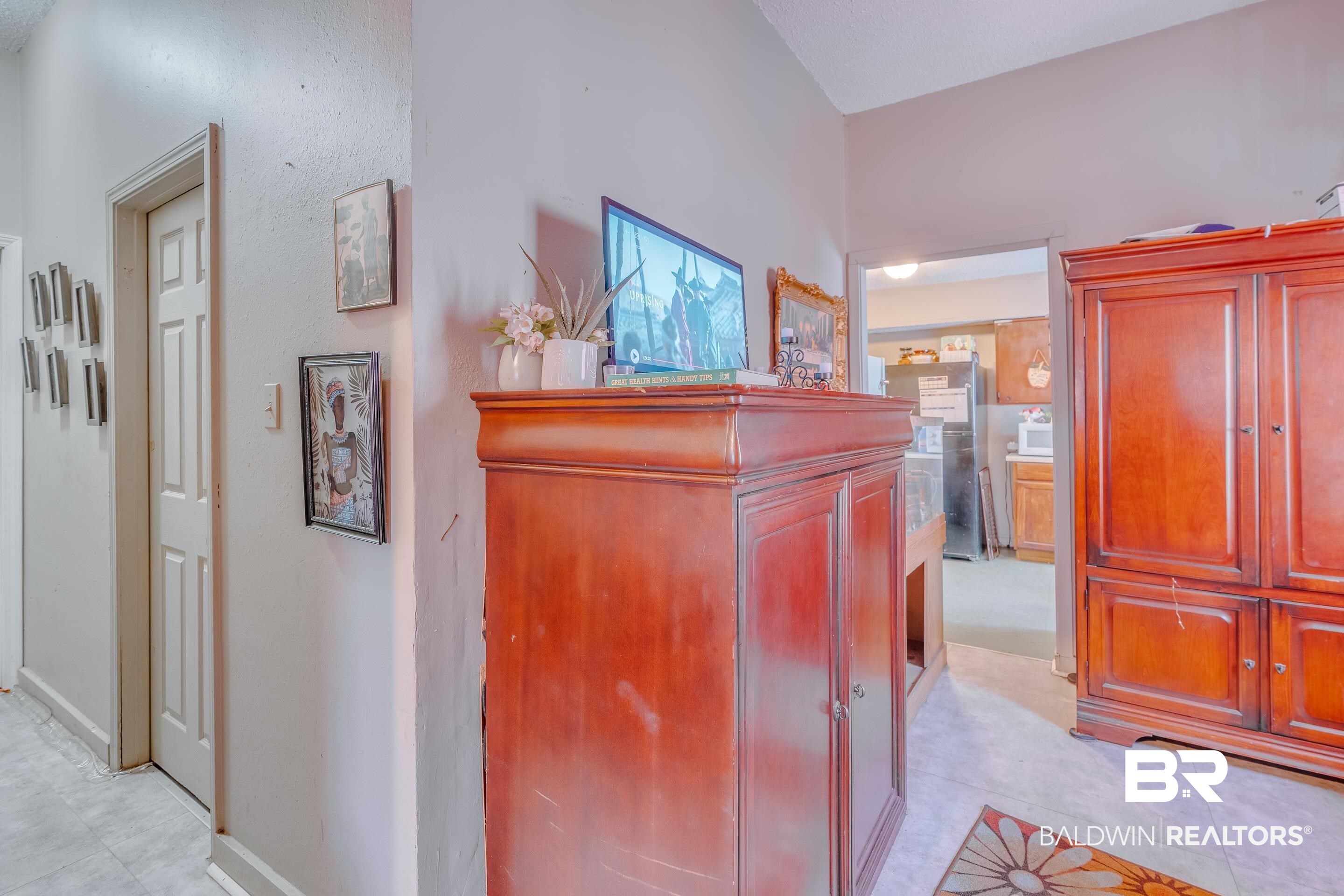 1156 Freeman Street Mobile, AL 36605 - Photo 15 of 22 Hall with light tile patterned floors